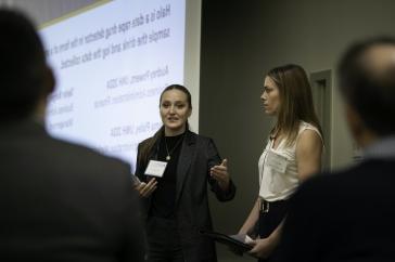 Students presenting on stage